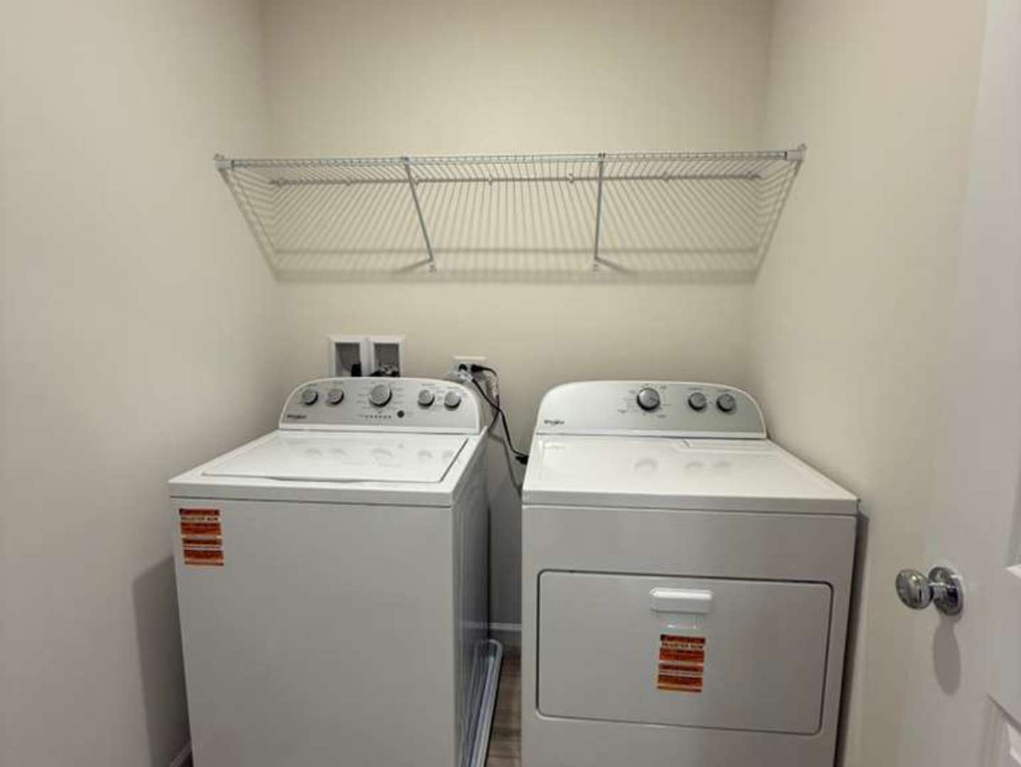 672 Switchgrass Way, Unit 58005 Bolingbrook, IL 60490 - Photo 17 of 19 a utility room with dryer and washer