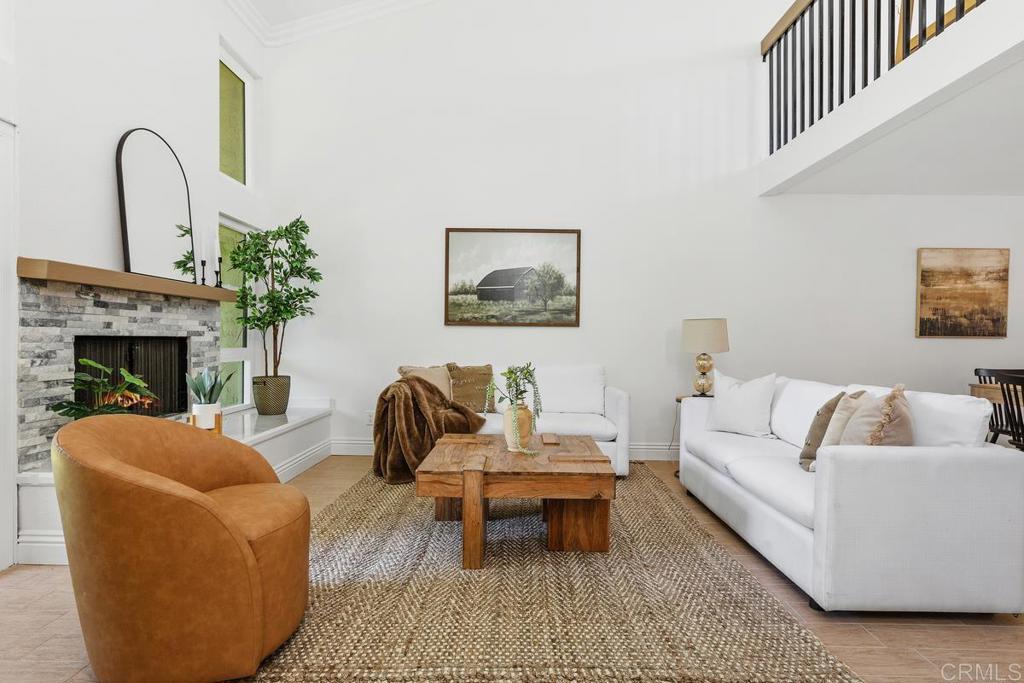 13611 Penina Street Poway, CA 92064 - Photo 11 of 30 a living room with furniture and a fireplace