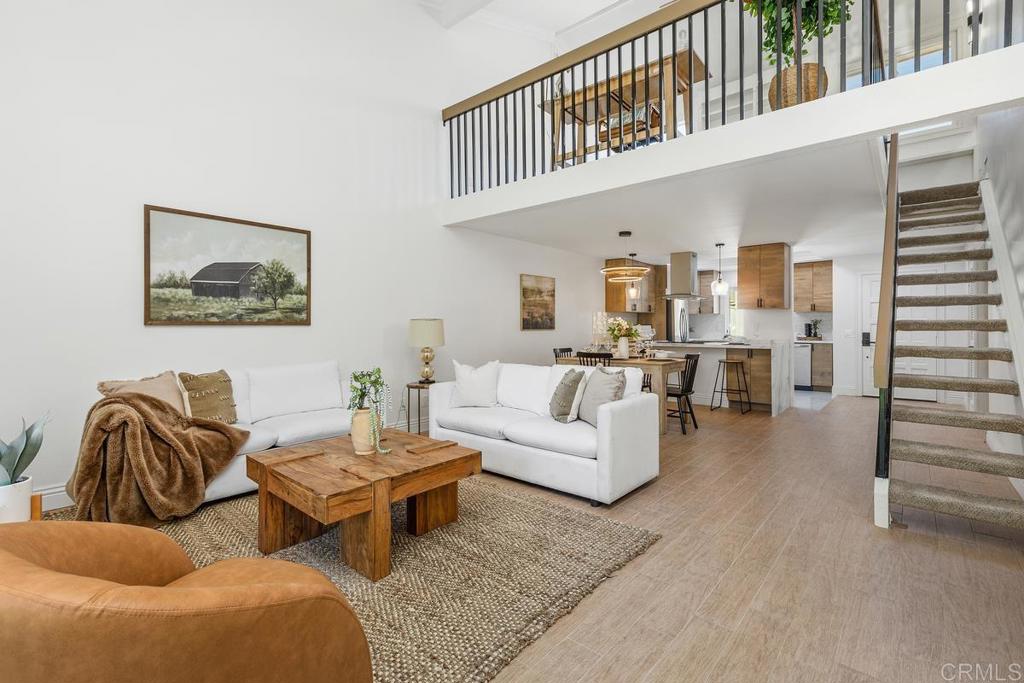 13611 Penina Street Poway, CA 92064 - Photo 12 of 30 a living room with furniture and a large window