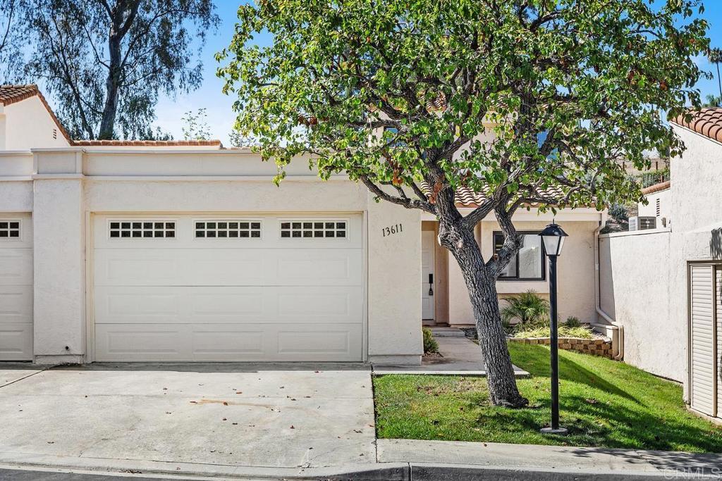 13611 Penina Street Poway, CA 92064 - Photo 2 of 30 a sign that is on the side of a road