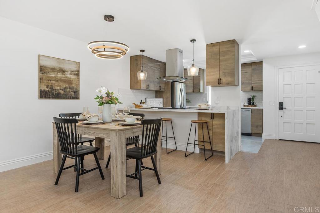 13611 Penina Street Poway, CA 92064 - Photo 7 of 30 a view of a dining room with furniture