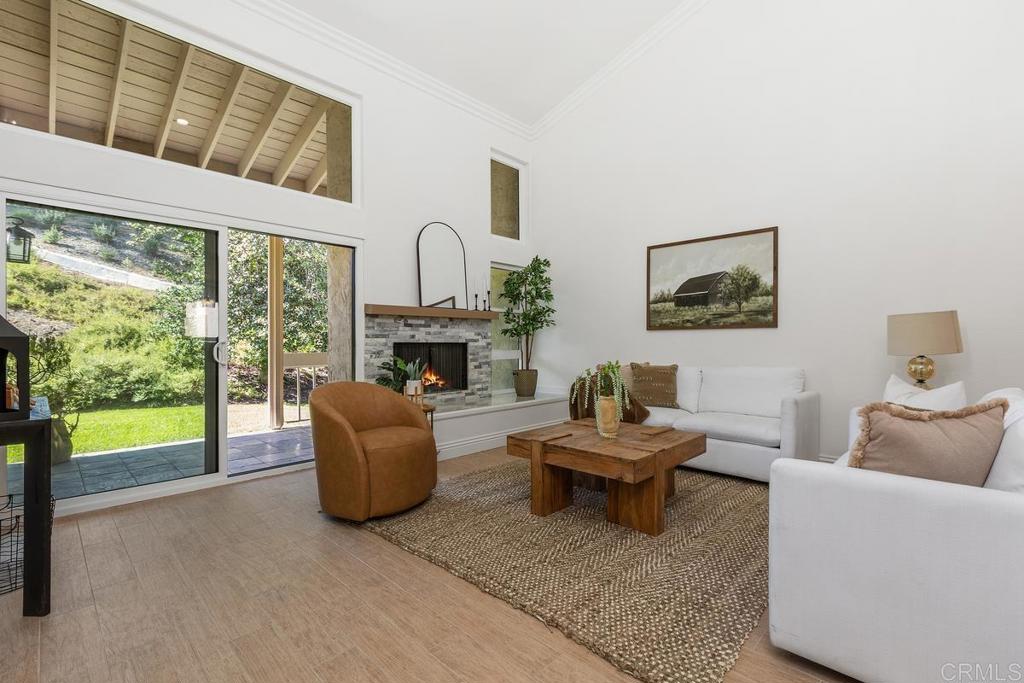 13611 Penina Street Poway, CA 92064 - Photo 9 of 30 a living room with furniture and a fireplace