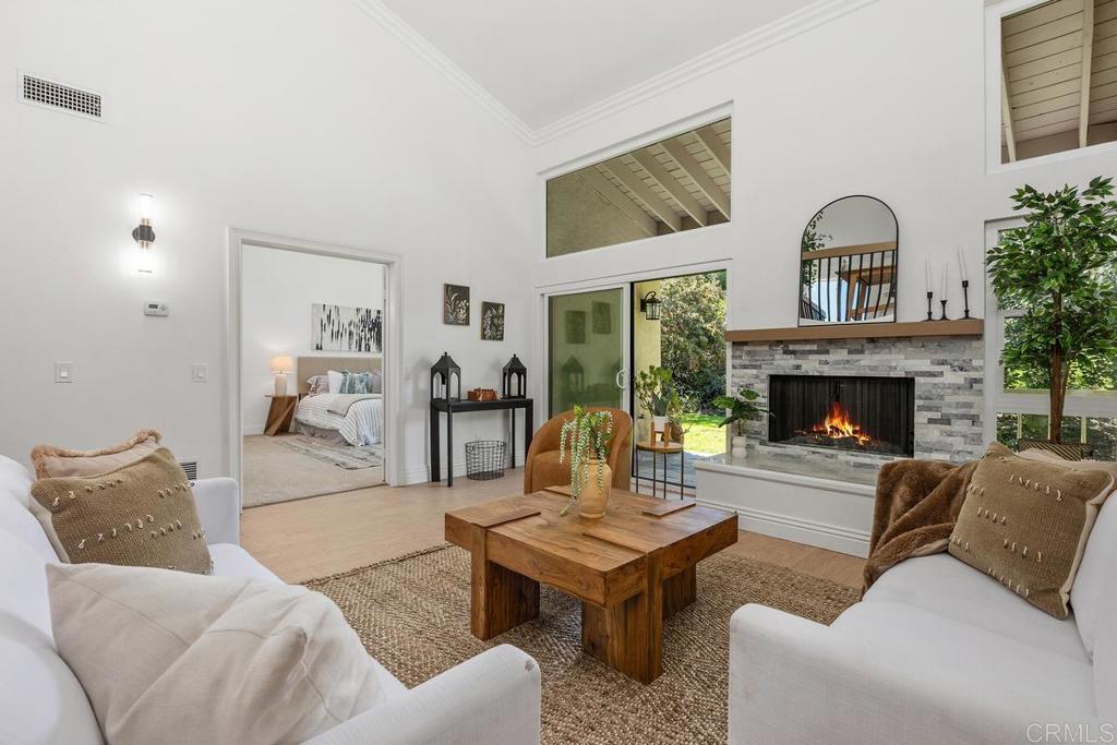 13611 Penina Street Poway, CA 92064 - Photo 10 of 30 a living room with furniture and a fireplace