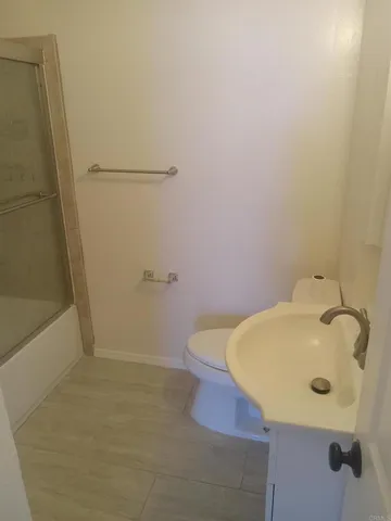 a bathroom with a sink and a toilet