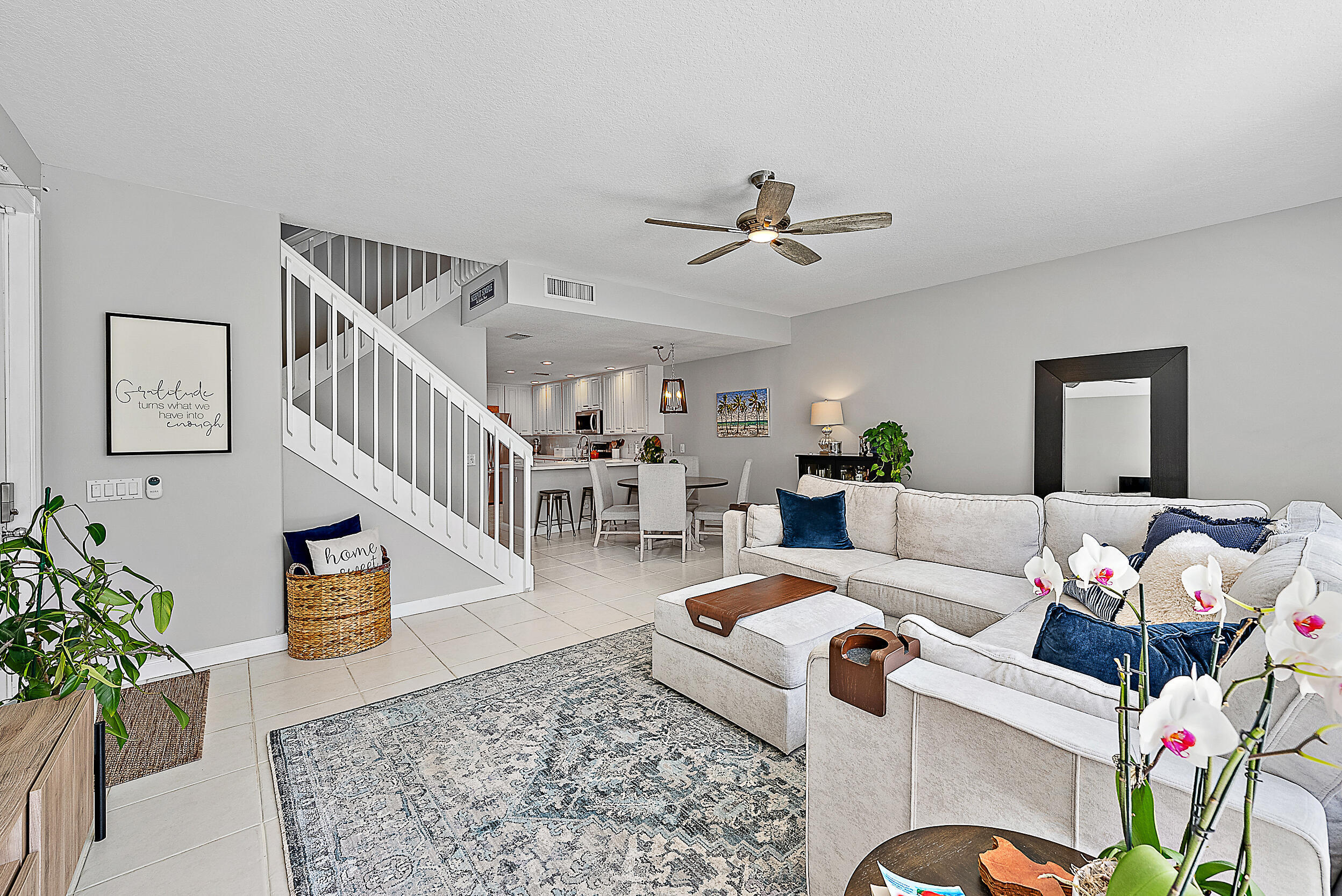 107 Rivinia Drive Jupiter, FL 33458 - Photo 6 of 28 a living room with furniture and a table