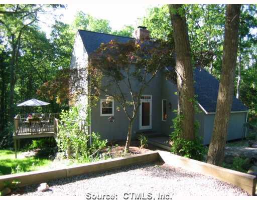 80 Lynn Road Essex, CT 06442 - Photo 1 of 1 Exterior Front. HIdden in the trees, this contemporary offers privacy and many areas to relax around the yard. The owners have removed many trees to complete a side yard for entertaining and to allow the home some extra sunlight.