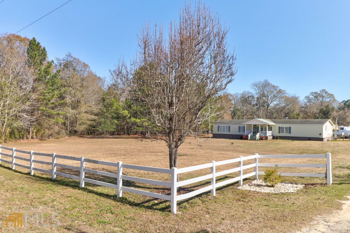 3898 Lawrence Church Road Pembroke, GA 31321 - Photo 1 of 1 a view of a outdoor space
