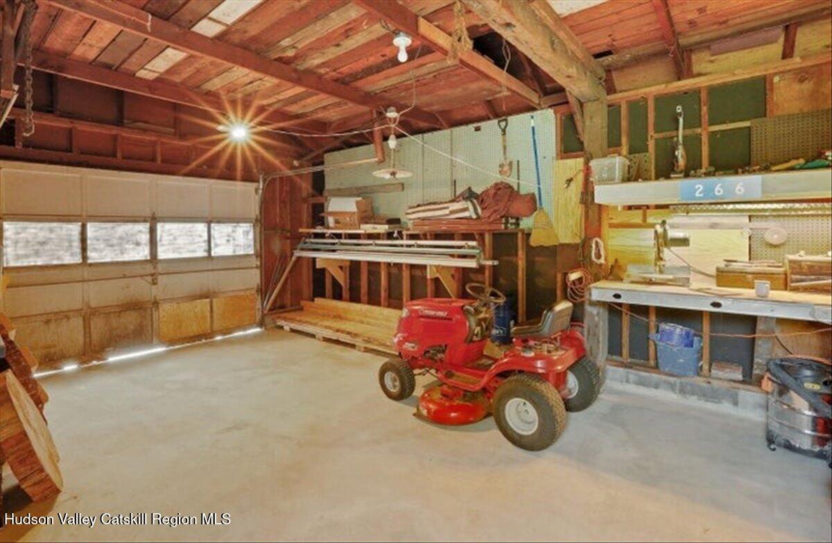 266 Scheller Park Road West Coxsackie, NY 12192 - Photo 18 of 26 a car is parked in a garage