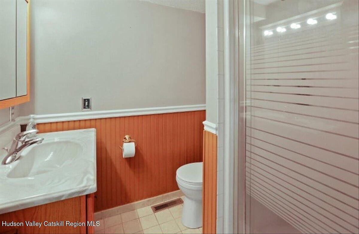 266 Scheller Park Road West Coxsackie, NY 12192 - Photo 9 of 26 a bathroom with a sink and toilet