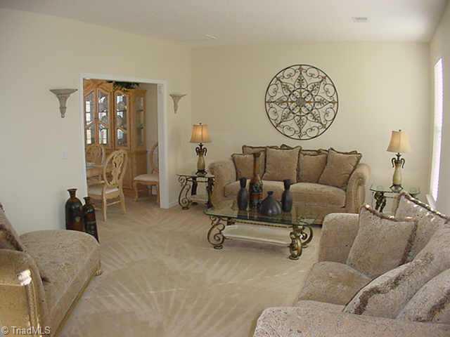 4706 Ridge Fall Road Greensboro, NC 27410 - Photo 5 of 9 Other. Formal Living Room in front off of Foyer flows into Formal Dining Room in back
