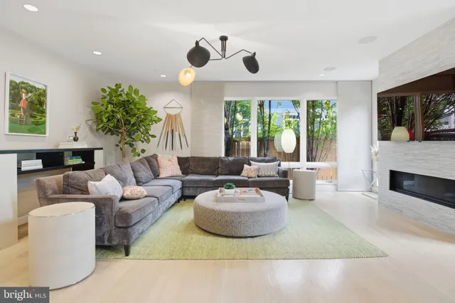 a bathroom with a double vanity sink mirror and toilet