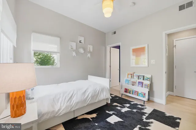 a view of a building with sitting area