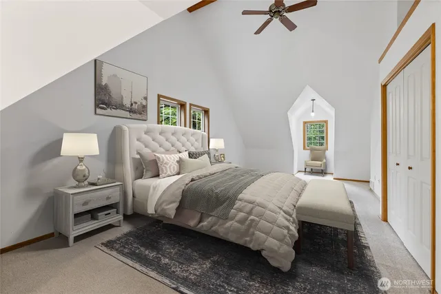 a bedroom with bed and window