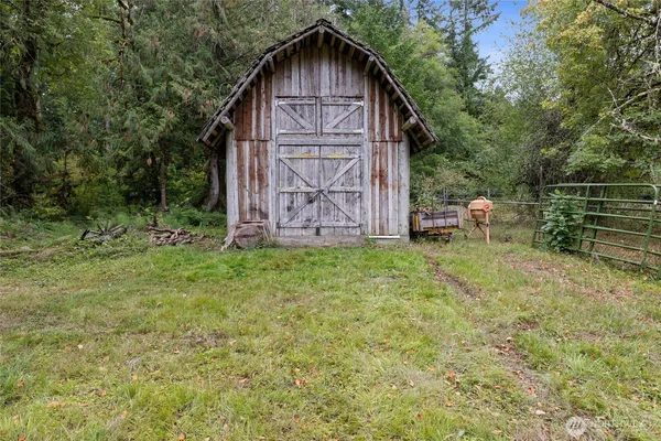 a backyard of a house with lots of green space