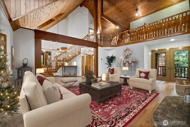 a living room with furniture or couch and a table