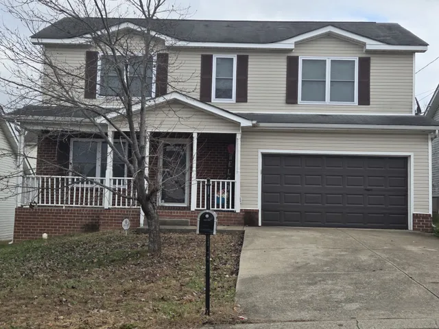 front view of a house with a garage