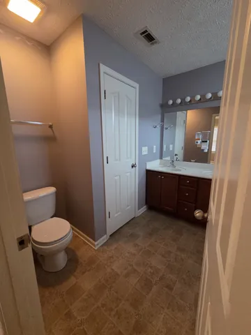 a bathroom with a sink and a toilet