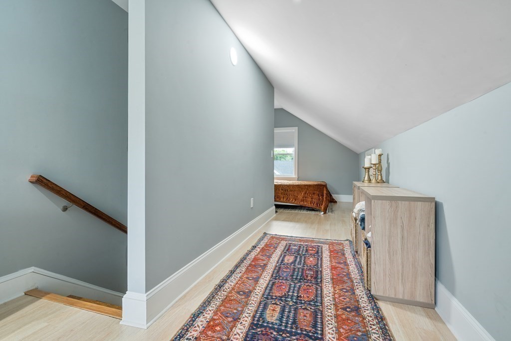 8 Loring Place, Unit 8 Boston, MA 02136 - Photo 14 of 23 a view of a hallway with wooden floor and staircase