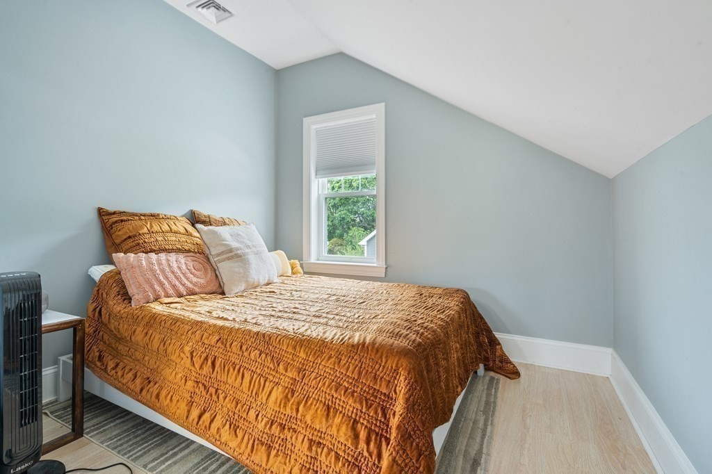 8 Loring Place, Unit 8 Boston, MA 02136 - Photo 15 of 23 a bedroom with a bed and a window