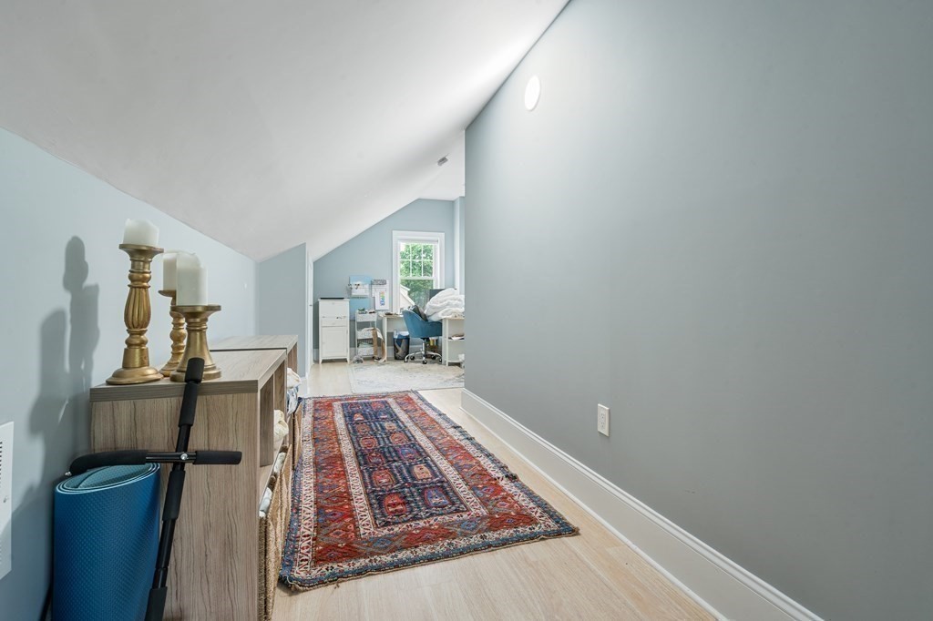 8 Loring Place, Unit 8 Boston, MA 02136 - Photo 16 of 23 a living room with furniture and a rug