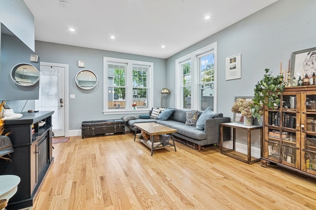 8 Loring Place, Unit 8 Boston, MA 02136 - Photo 5 of 23 a living room with furniture and a large window