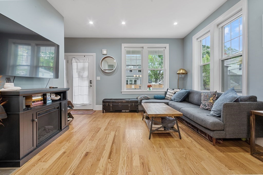 8 Loring Place, Unit 8 Boston, MA 02136 - Photo 6 of 23 a living room with furniture and a large window
