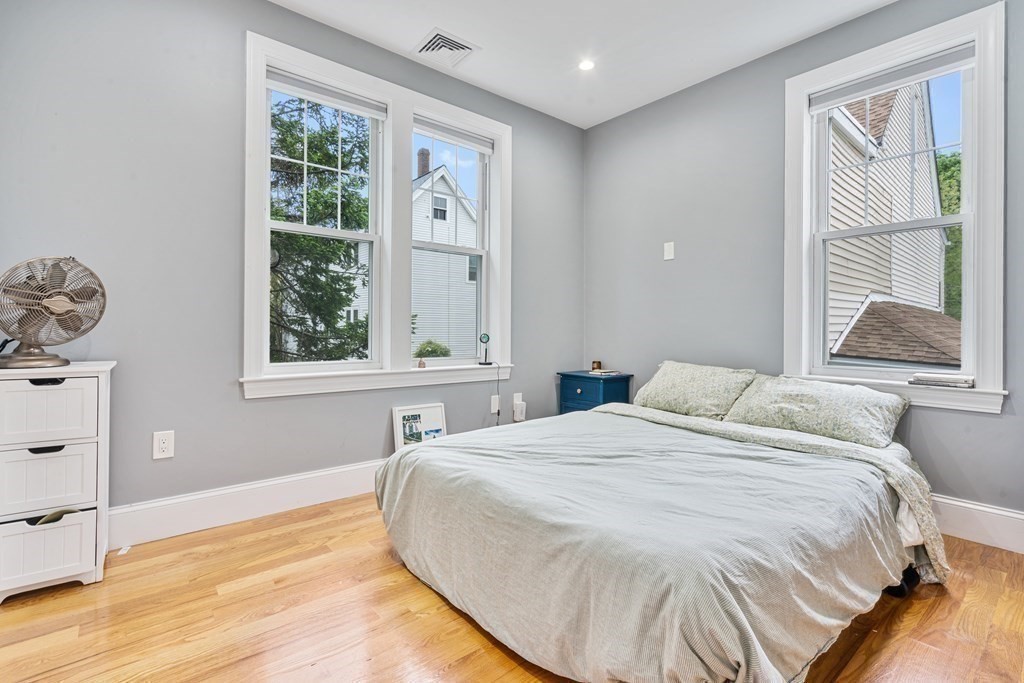 8 Loring Place, Unit 8 Boston, MA 02136 - Photo 9 of 23 a bedroom with a bed and a window