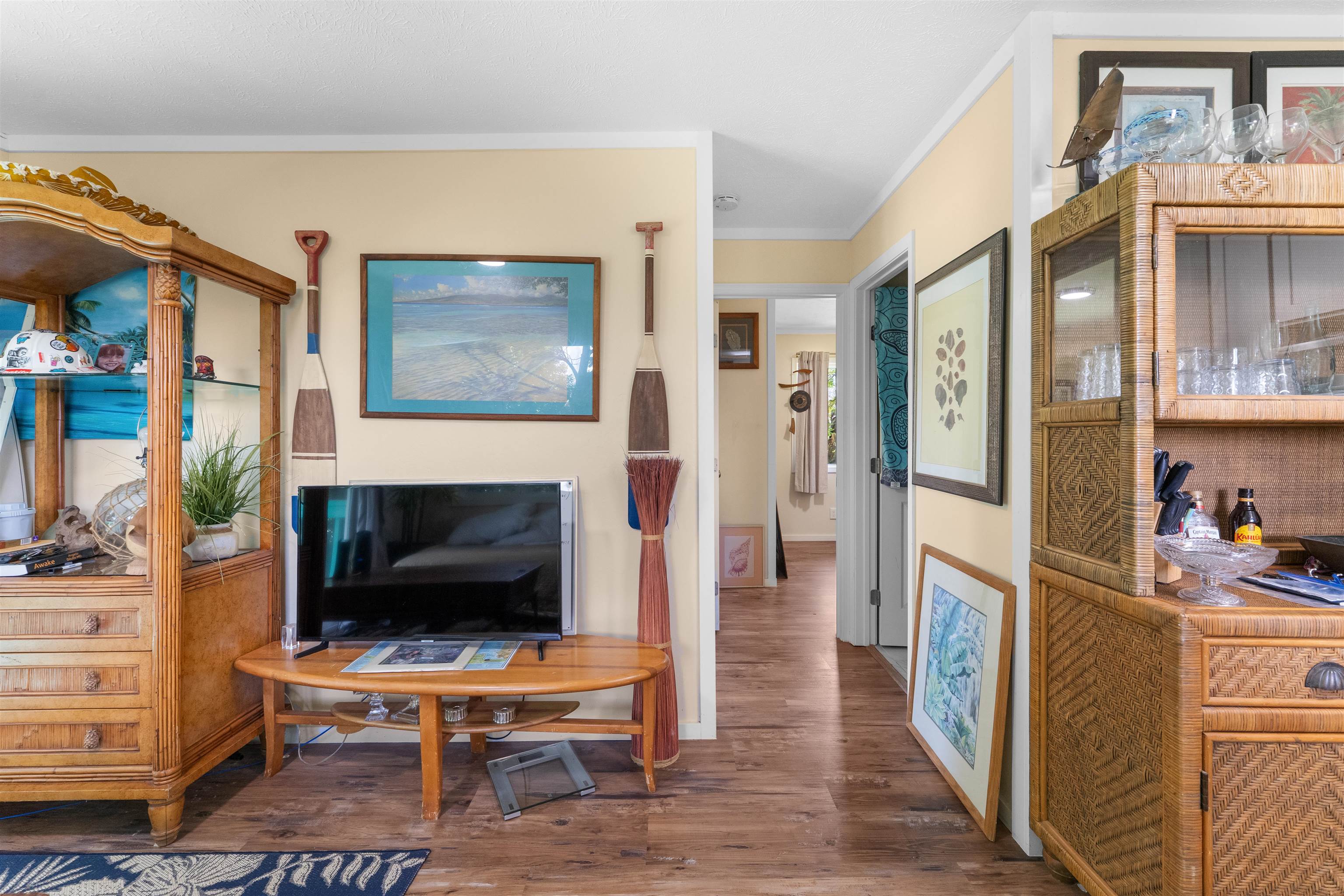 2115 Kaupakalua Road Haiku, HI 96708 - Photo 17 of 26 a view of a livingroom with furniture and a flat screen tv