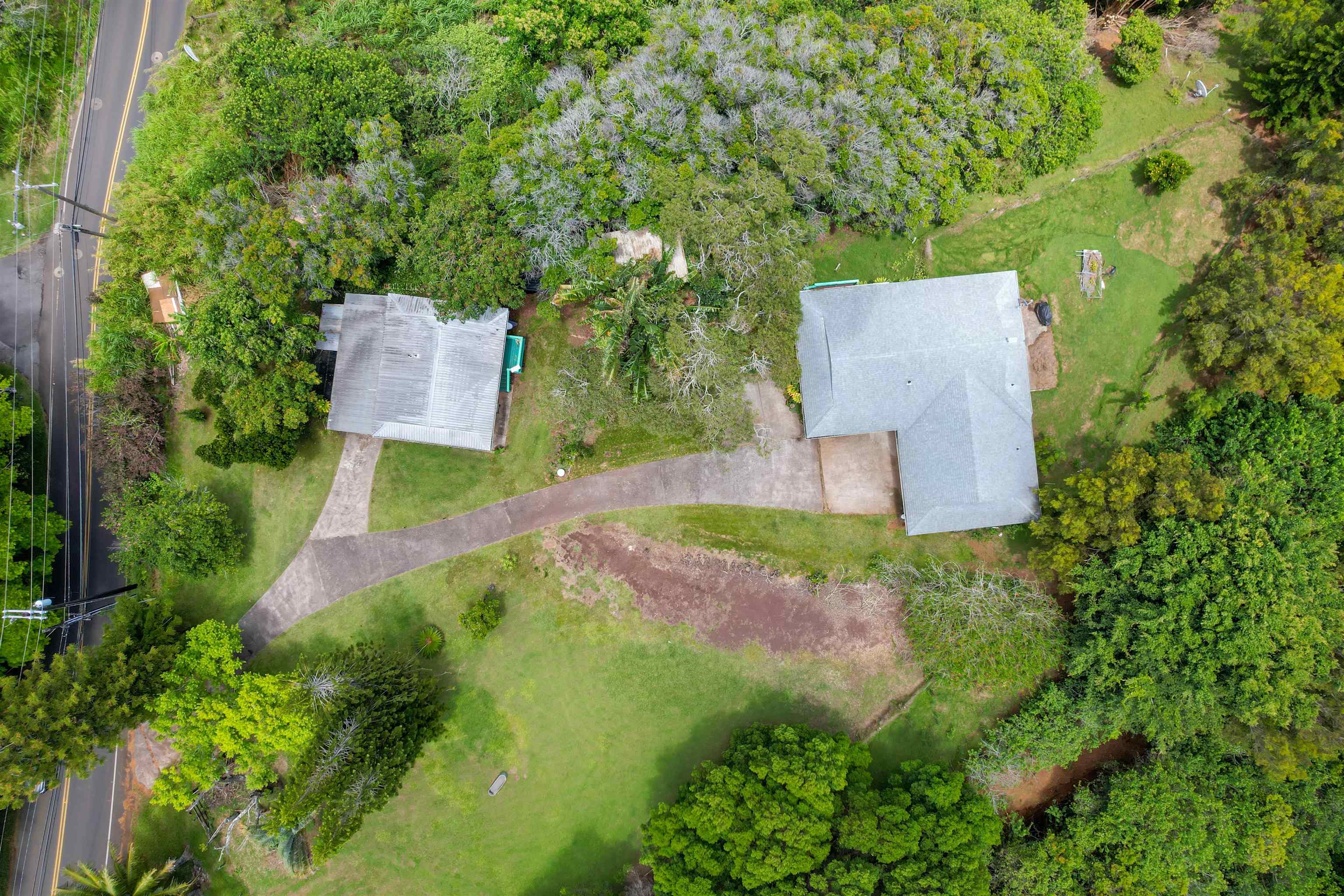 2115 Kaupakalua Road Haiku, HI 96708 - Photo 23 of 26 an aerial view of a house with a yard