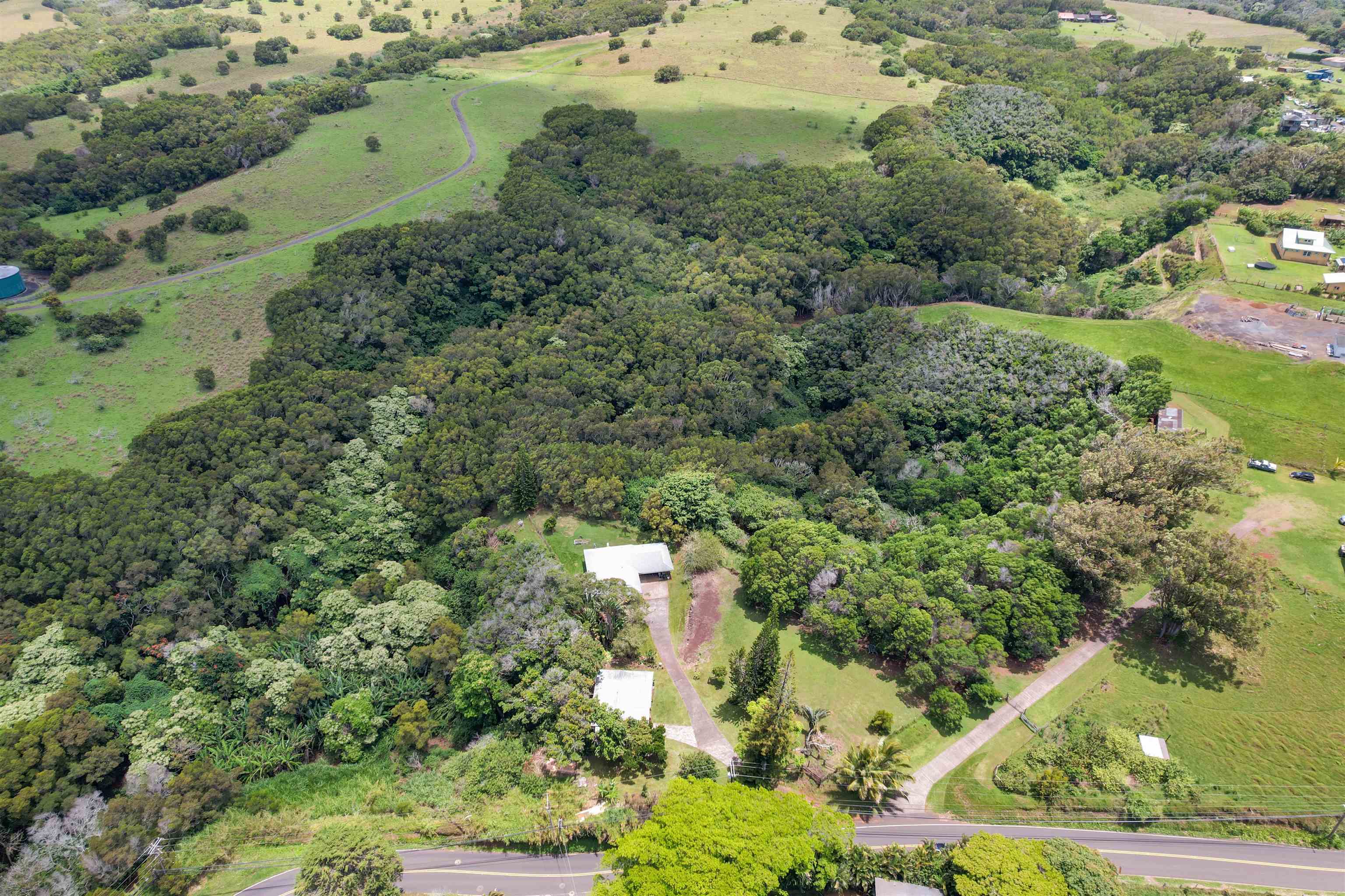 2115 Kaupakalua Road Haiku, HI 96708 - Photo 24 of 26 an aerial view of residential house with outdoor space and trees all around