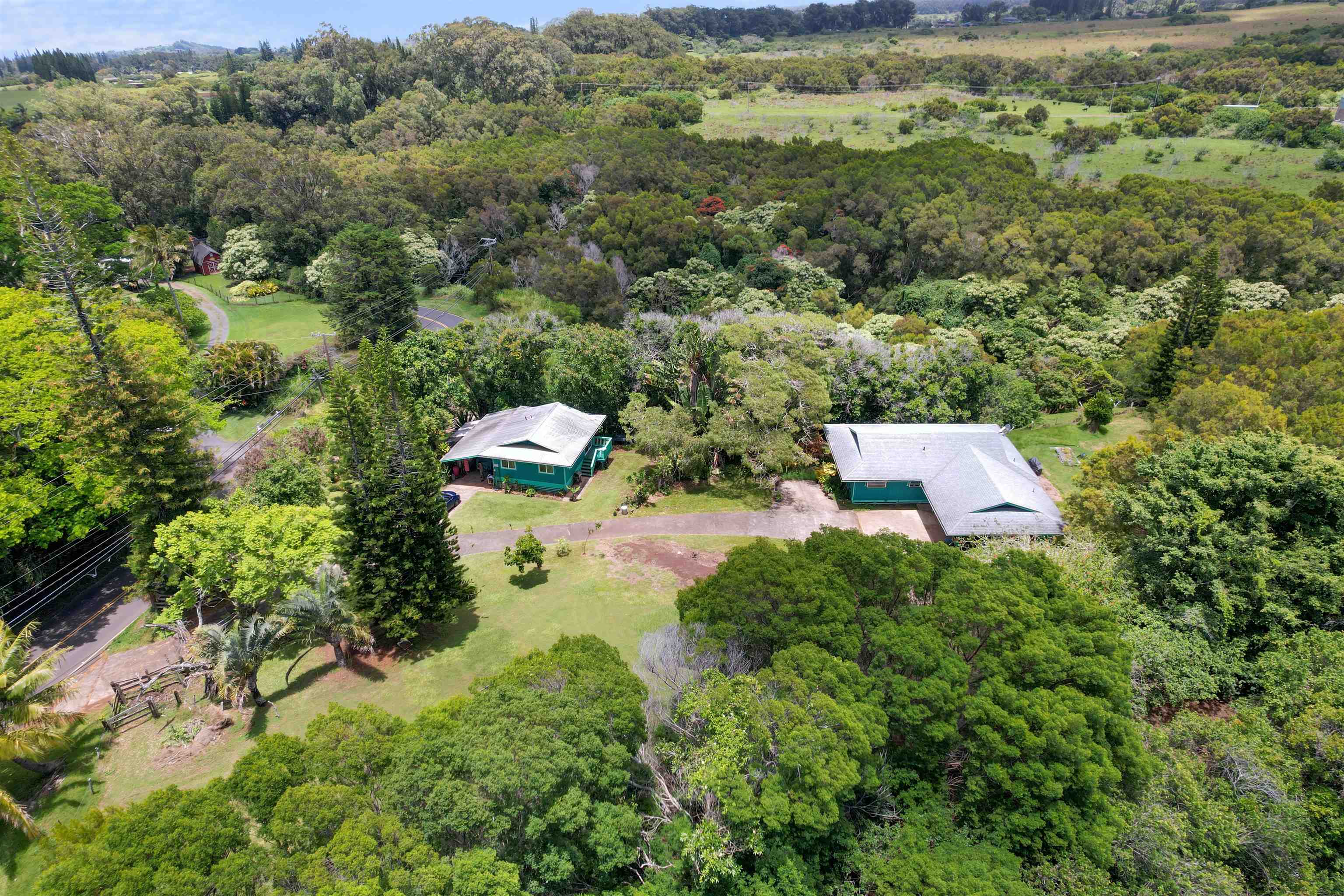 2115 Kaupakalua Road Haiku, HI 96708 - Photo 26 of 26 an aerial view of a house with a yard