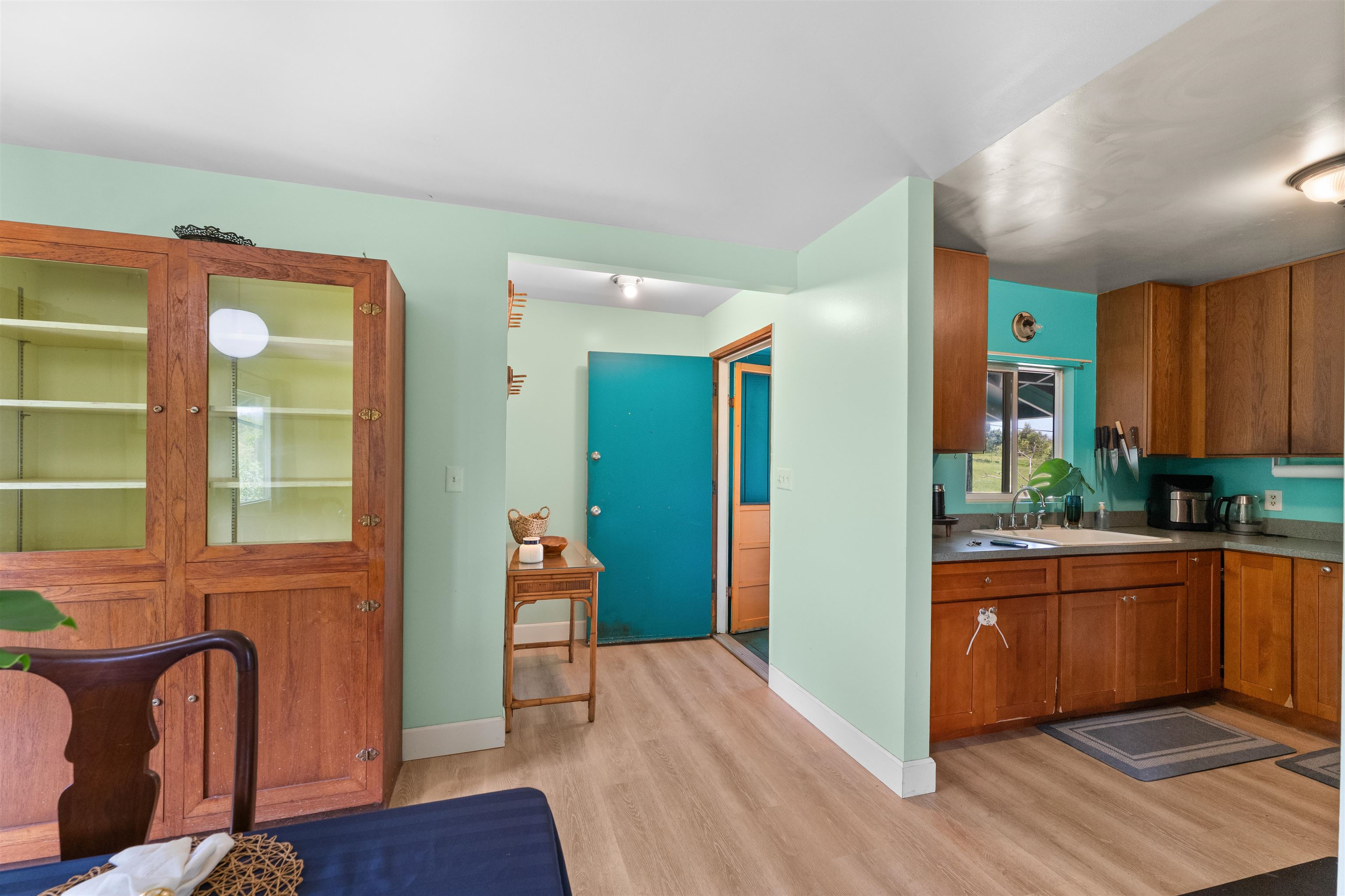 2115 Kaupakalua Road Haiku, HI 96708 - Photo 3 of 26 a kitchen with stainless steel appliances granite countertop a refrigerator and a sink