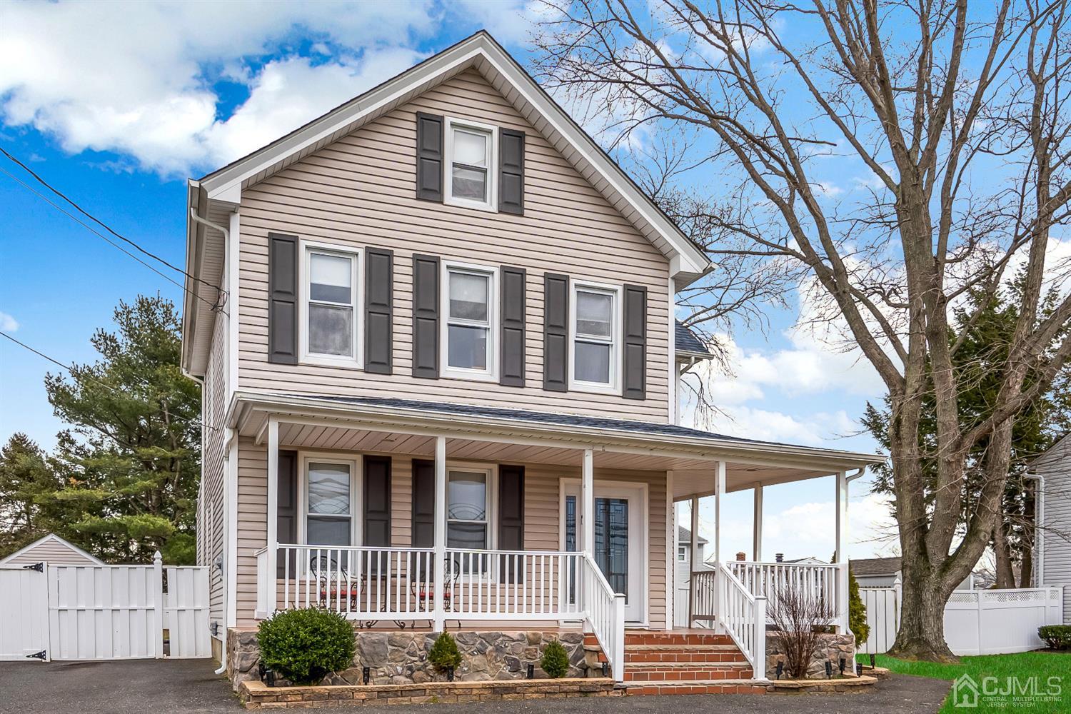 605 Beers Street Hazlet, NJ 07730 - Photo 1 of 32 a front view of a house with a yard