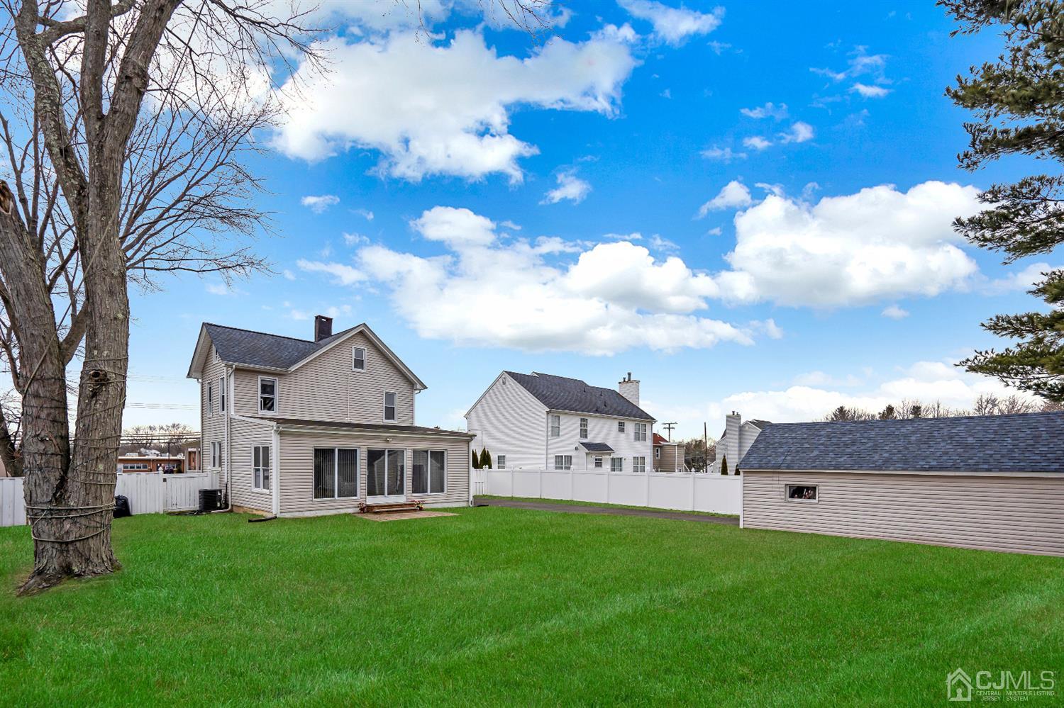 605 Beers Street Hazlet, NJ 07730 - Photo 2 of 32 a view of a house with a big yard