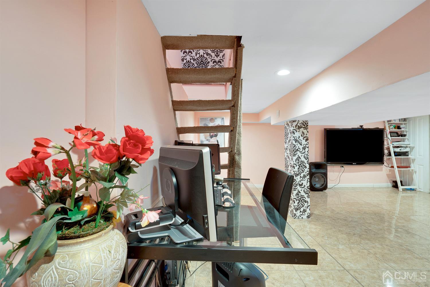 605 Beers Street Hazlet, NJ 07730 - Photo 28 of 32 a view of living room with furniture and a flat screen tv