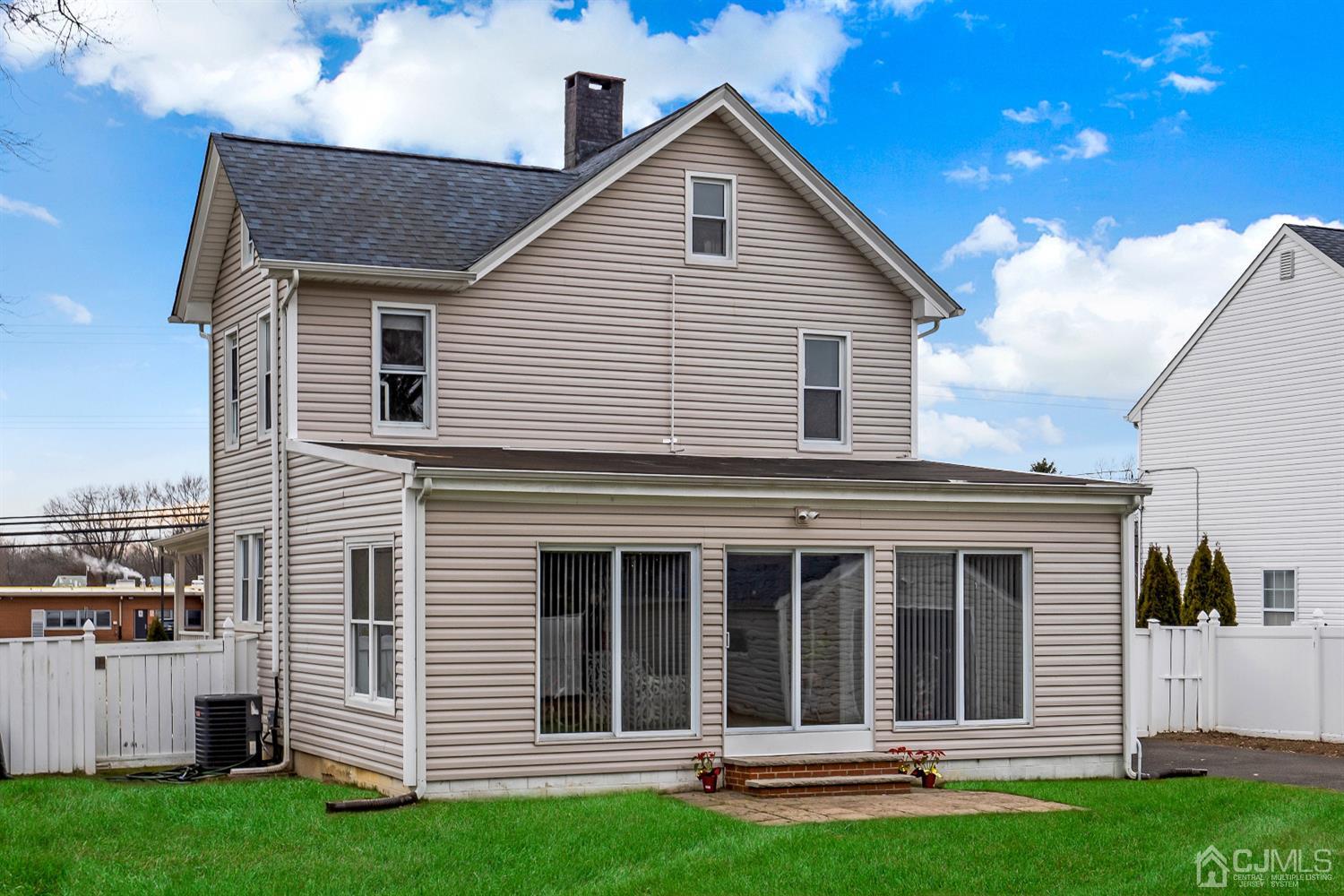 605 Beers Street Hazlet, NJ 07730 - Photo 29 of 32 a view of a house with backyard and porch with a large tree