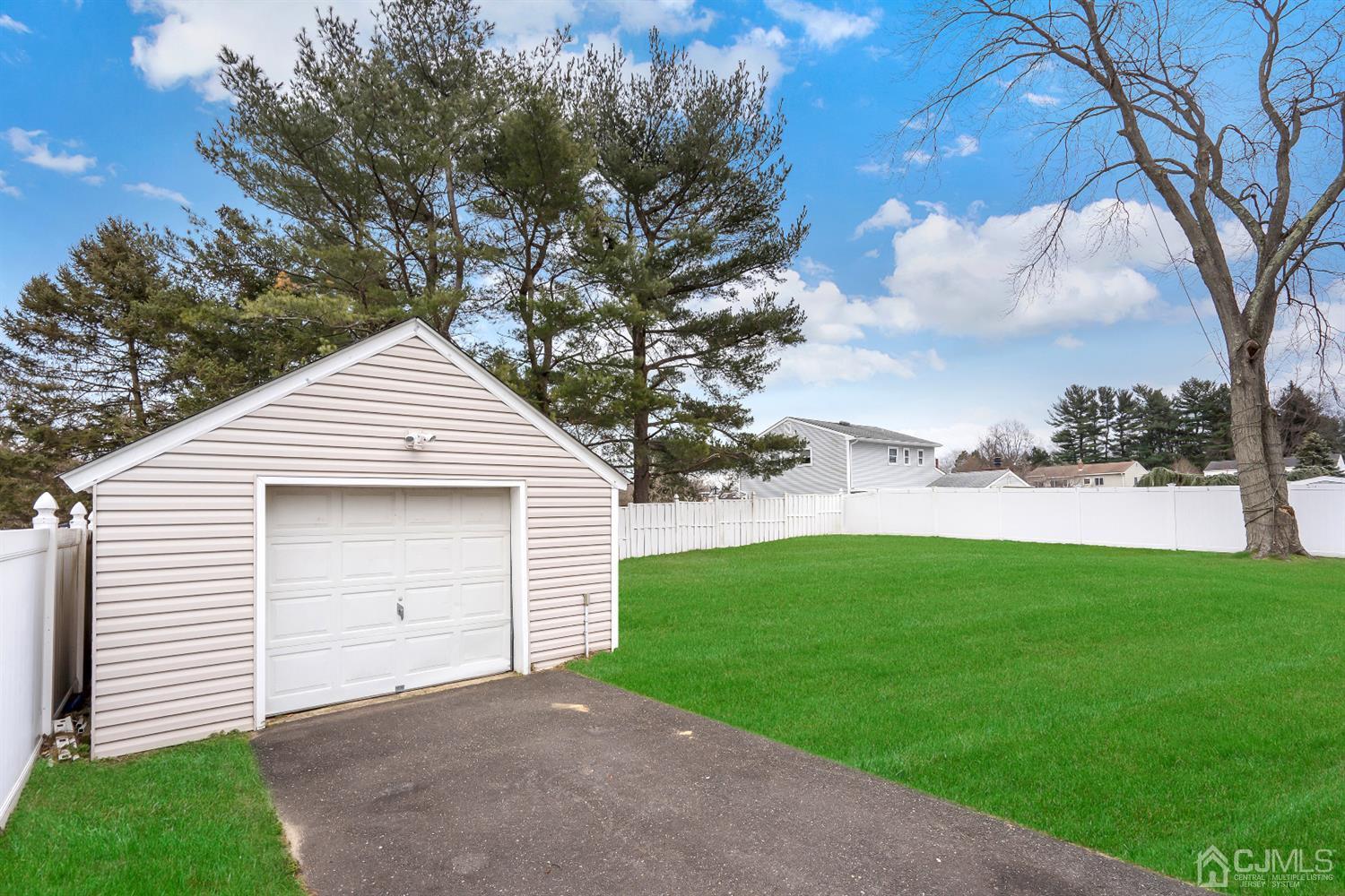 605 Beers Street Hazlet, NJ 07730 - Photo 32 of 32 a front view of a house with a yard