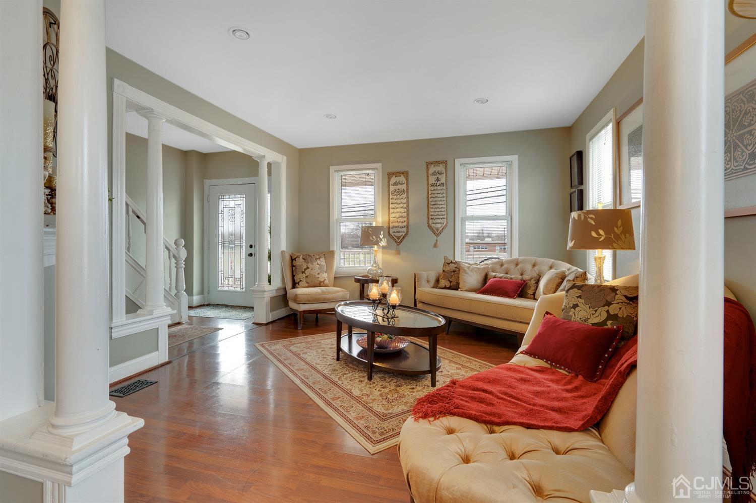 605 Beers Street Hazlet, NJ 07730 - Photo 5 of 32 a living room with furniture and a large window