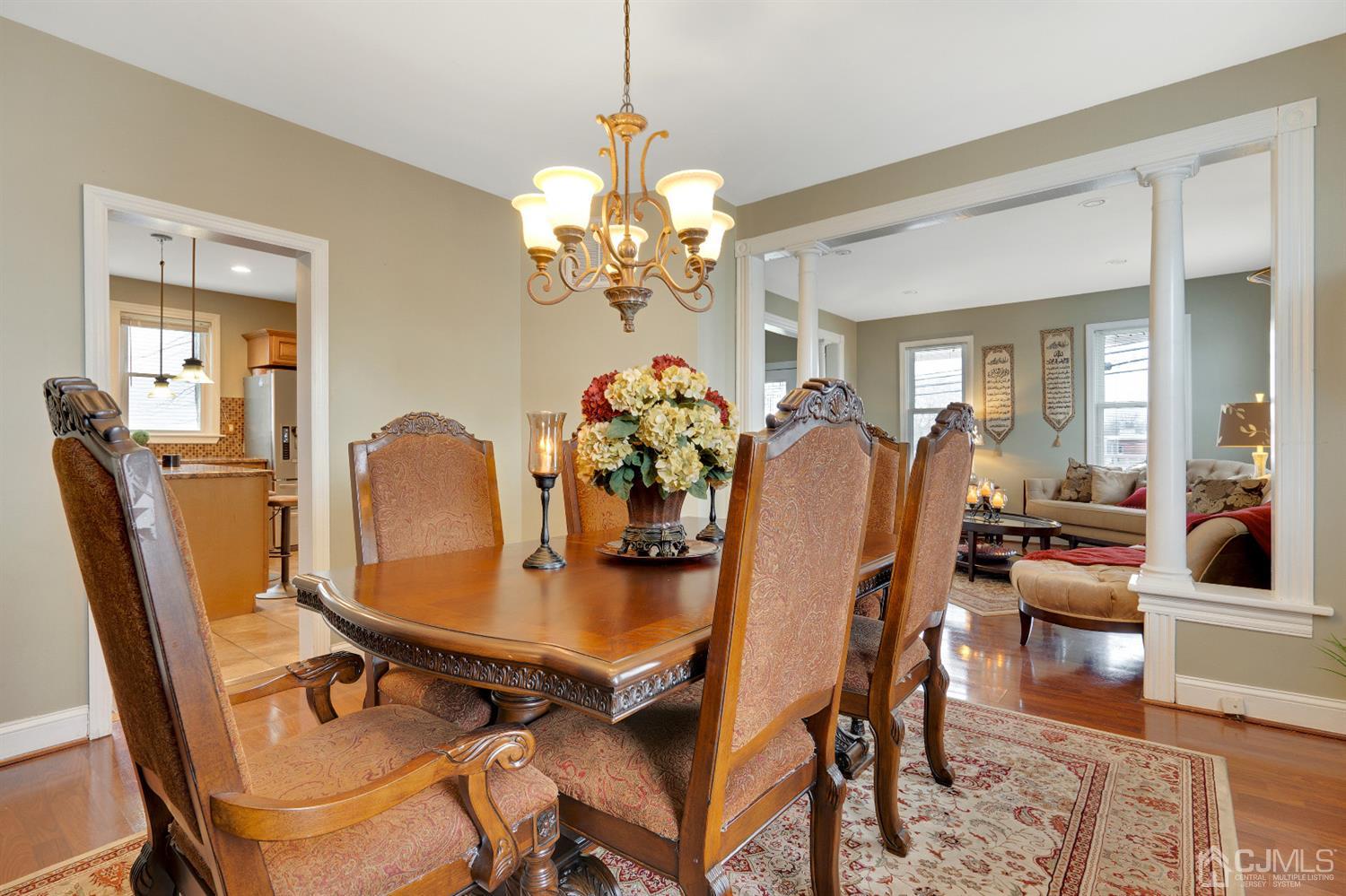 605 Beers Street Hazlet, NJ 07730 - Photo 7 of 32 a dining room with furniture and chandelier