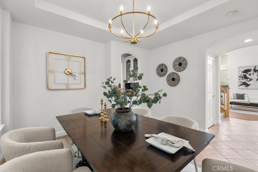 25930 Franklin Lane Stevenson Ranch, CA 91381 - Photo 14 of 47 a view of a dining room with furniture and chandelier
