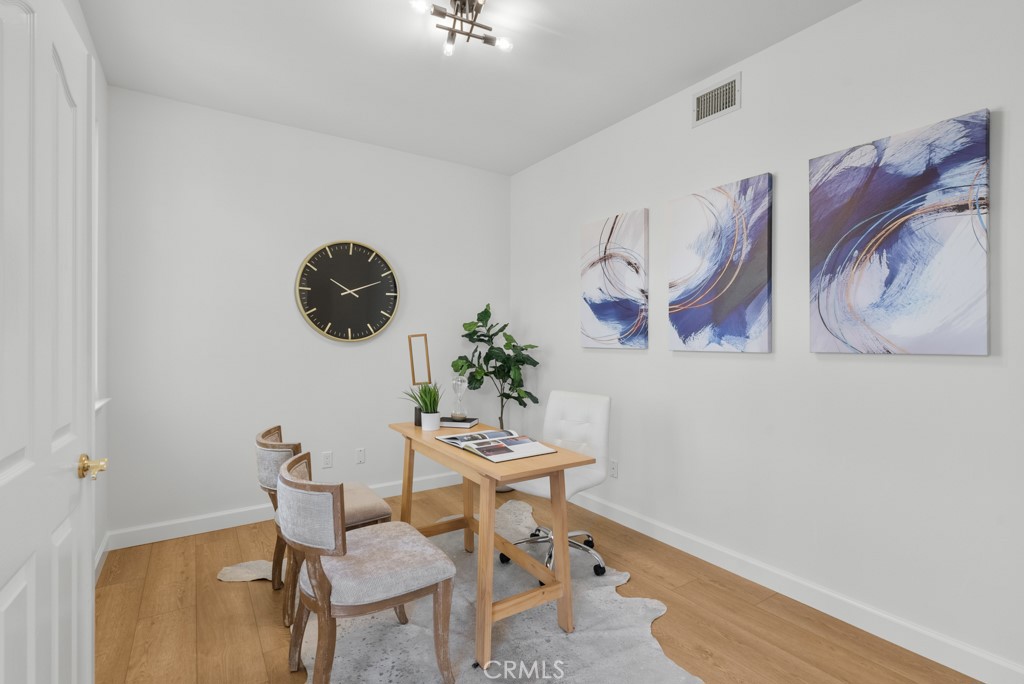 25930 Franklin Lane Stevenson Ranch, CA 91381 - Photo 15 of 47 a dining room with furniture and wooden floor