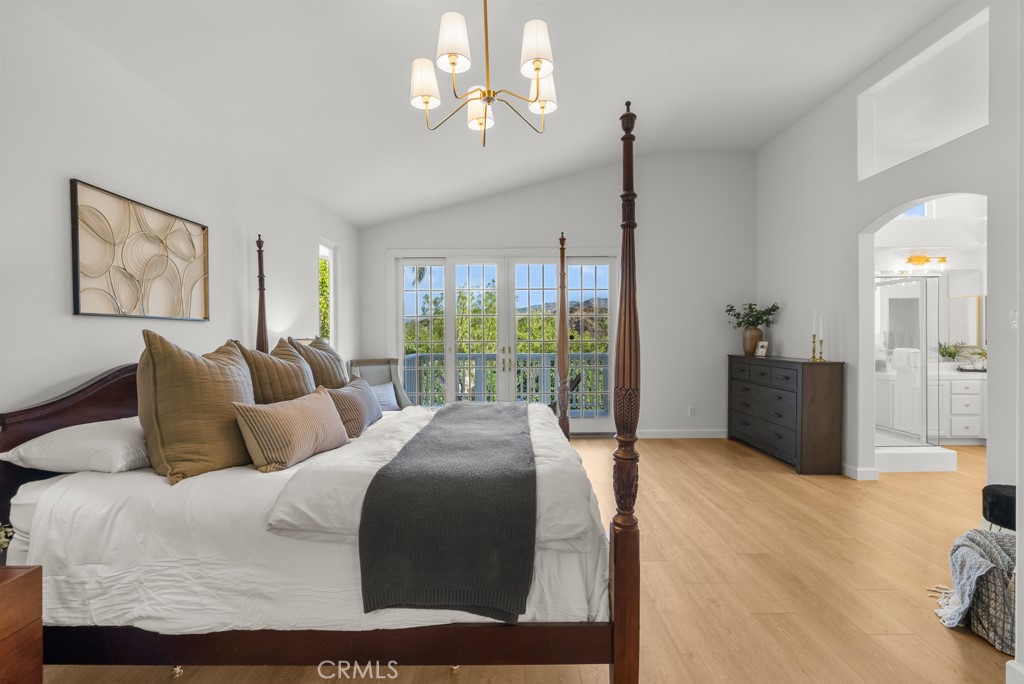 25930 Franklin Lane Stevenson Ranch, CA 91381 - Photo 18 of 47 a bedroom with a bed window and walk in closet