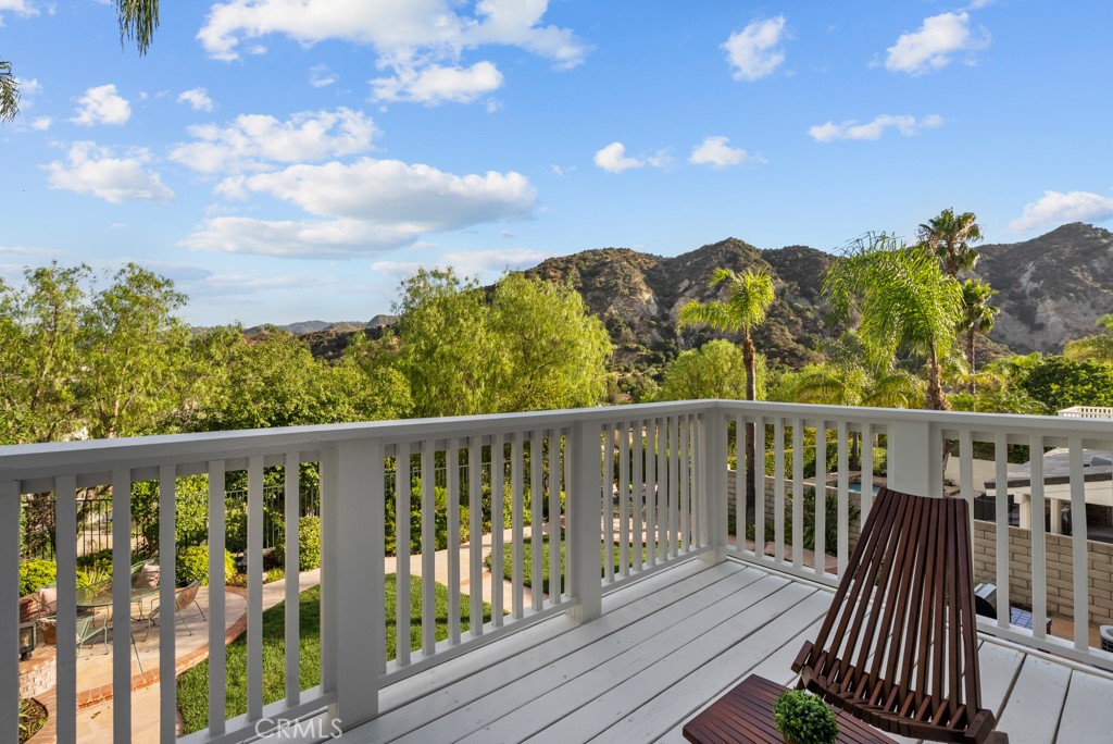 25930 Franklin Lane Stevenson Ranch, CA 91381 - Photo 21 of 47 a view of a balcony with wooden floor & fence