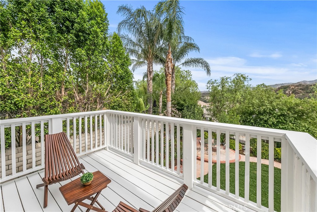 25930 Franklin Lane Stevenson Ranch, CA 91381 - Photo 22 of 47 a view of a wooden deck with a bench