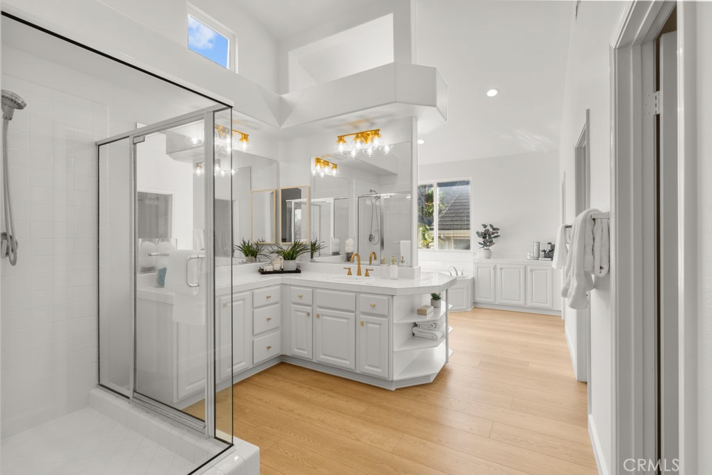 25930 Franklin Lane Stevenson Ranch, CA 91381 - Photo 23 of 47 a bathroom with a double vanity sink mirror and shower