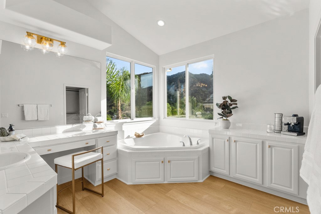 25930 Franklin Lane Stevenson Ranch, CA 91381 - Photo 24 of 47 a large white kitchen with a large window and sink
