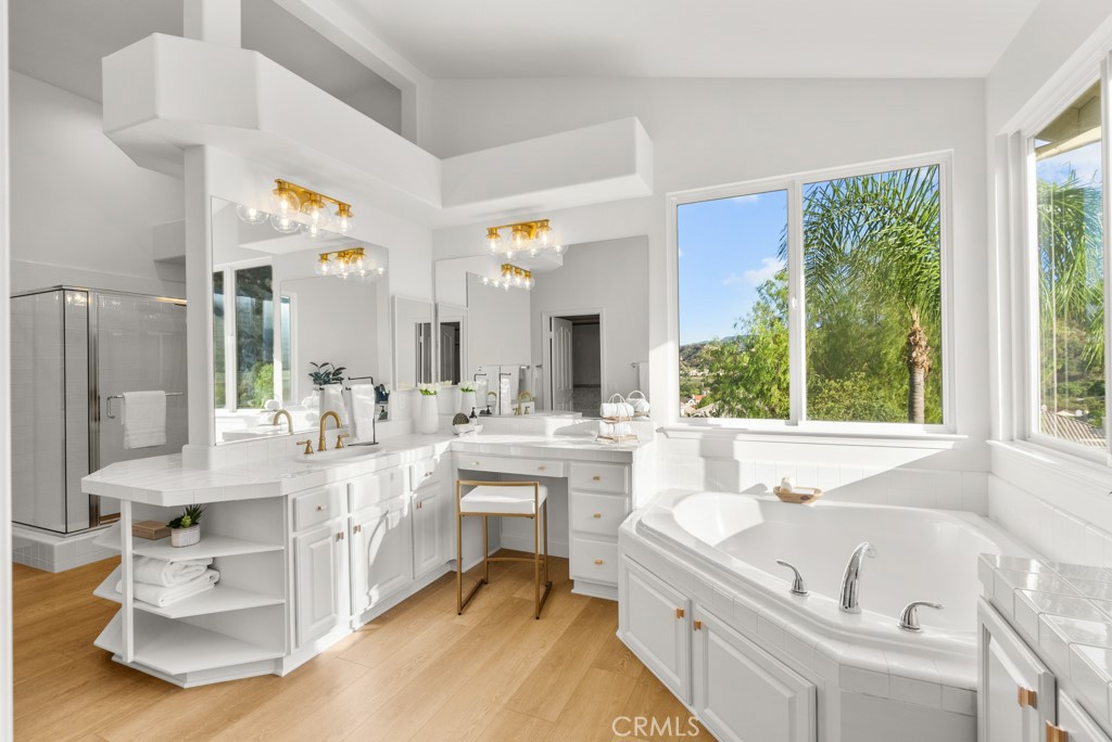25930 Franklin Lane Stevenson Ranch, CA 91381 - Photo 26 of 47 a large white kitchen with a large window and stainless steel appliances