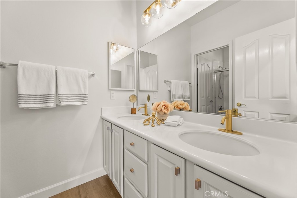 25930 Franklin Lane Stevenson Ranch, CA 91381 - Photo 32 of 47 a bathroom with a sink and a mirror