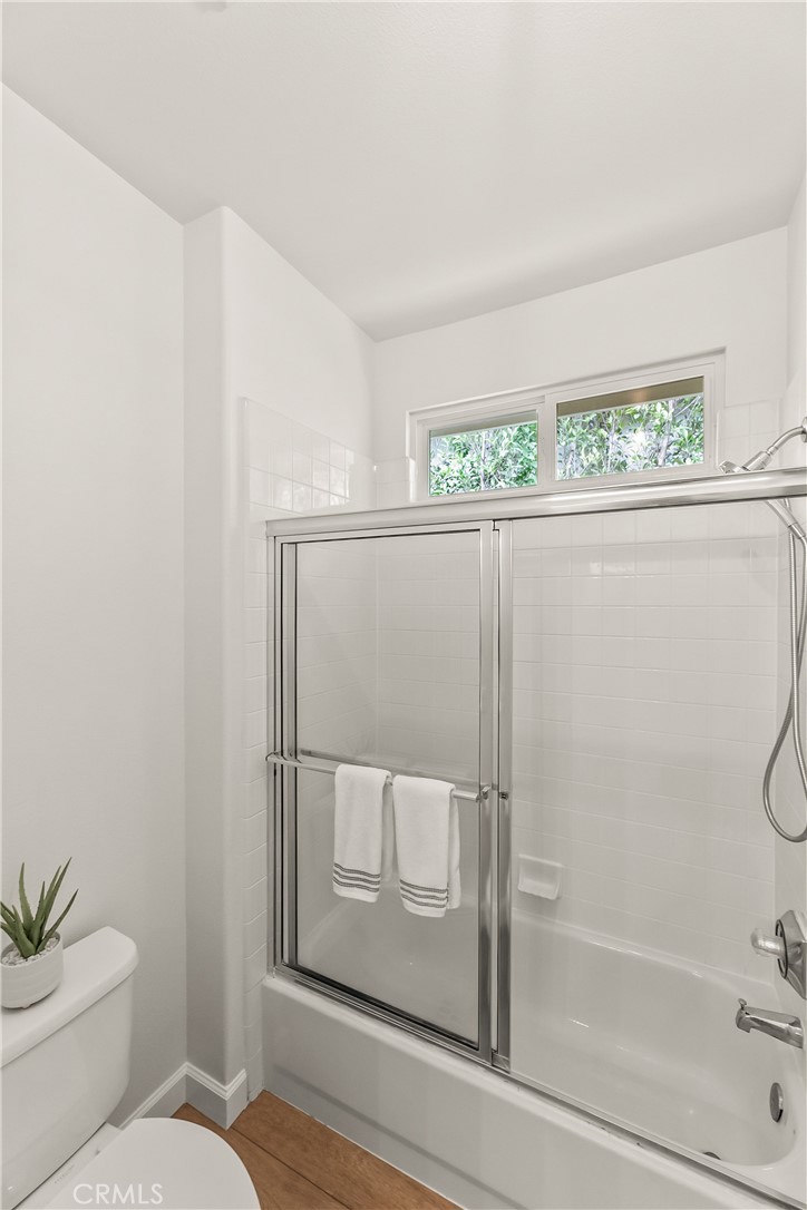 25930 Franklin Lane Stevenson Ranch, CA 91381 - Photo 33 of 47 a bathroom with a granite countertop sink mirror and toilet