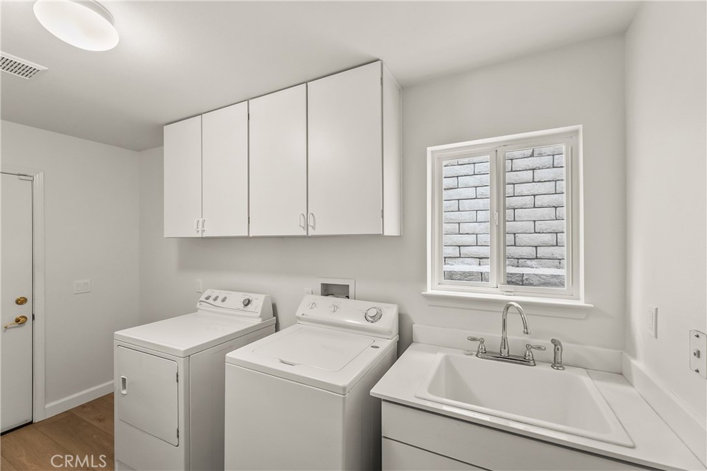 25930 Franklin Lane Stevenson Ranch, CA 91381 - Photo 34 of 47 a utility room with dryer and washer
